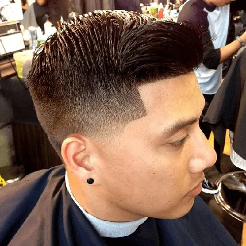 low taper fade comb over haircut