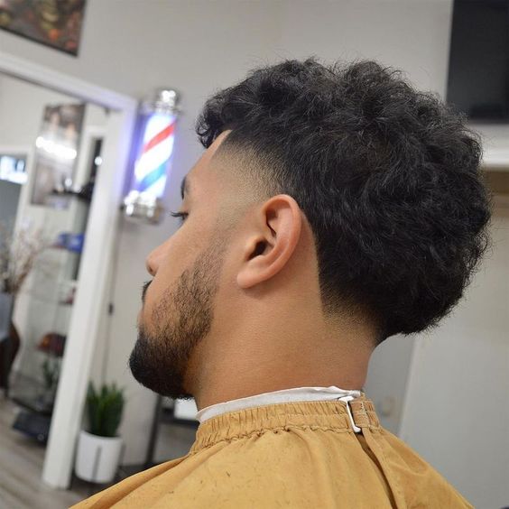 Low Burst Fade Mullet Curly Hair