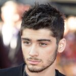 Low Taper Fade Messy Hair For Men