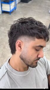 Low Taper Fade Straight Hair Messy Top
