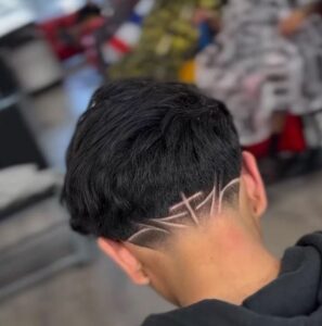 Low Taper Fade with Tribal Design