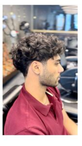 Low Taper Middle Part with Long Curly Hair
