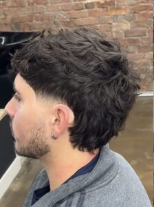 Messy Modern Mullet With Low Taper Fade